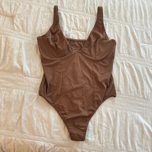 Brown bodysuit